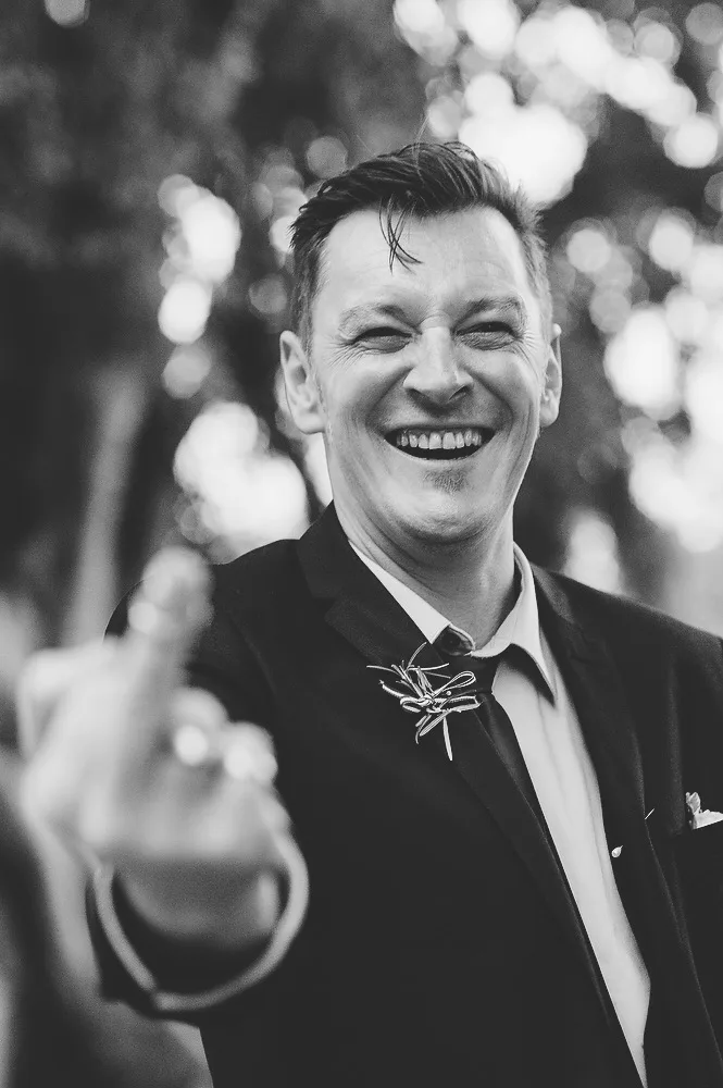 Groom giving the camera the finger