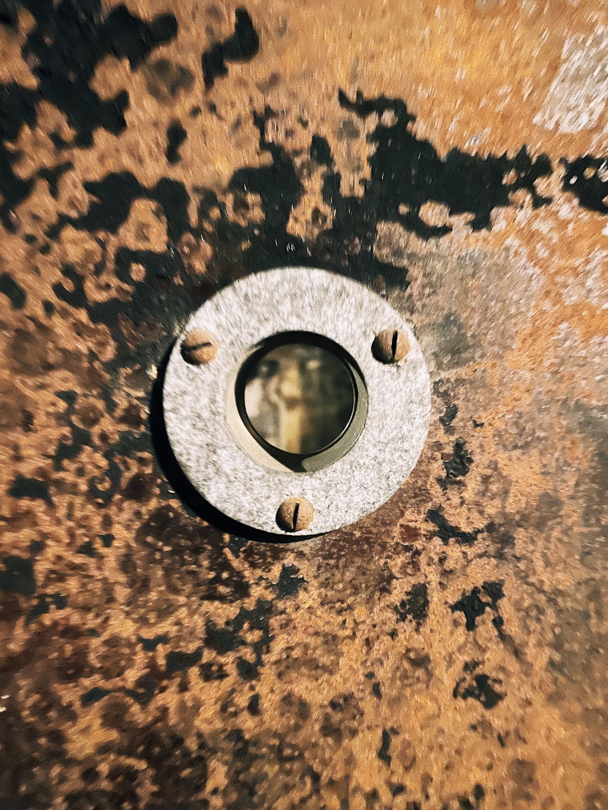 a rusted porthole fitting, close up